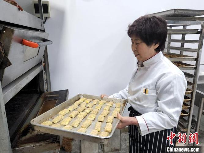 (新春走基层)博物馆里的传承人:寻着文献复原千年孔府糕点